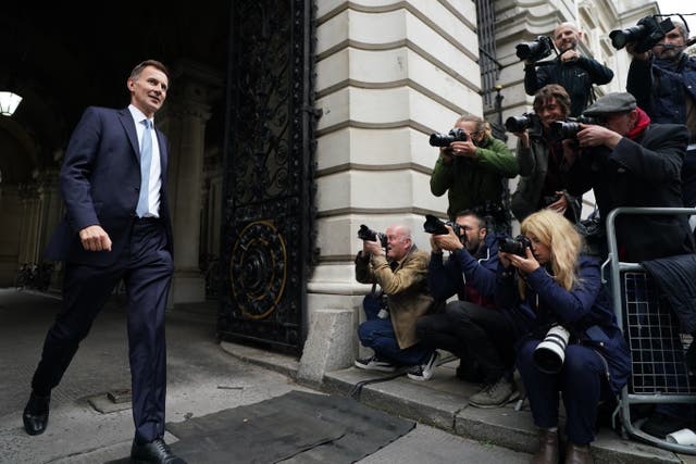Jeremy Hunt has said he will be delivering what is effectively a ‘proper’ Budget at the end of the month (Stefan Rousseau/PA)