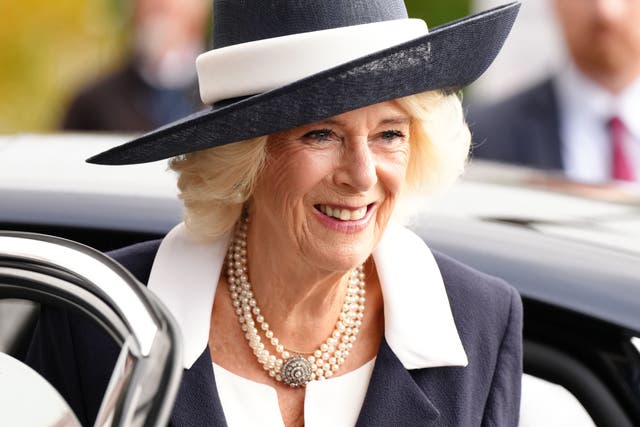 The Queen Consort was all smiles as she arrived for the QIPCO British Champions Day at Ascot Racecourse (John Walton/PA)