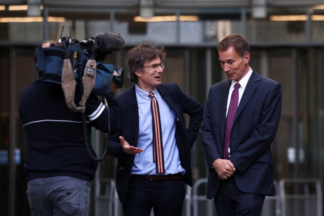 <p>Jeremy Hunt is interviewed by Robert Peston on Saturday, his first full day as chancellor</p>