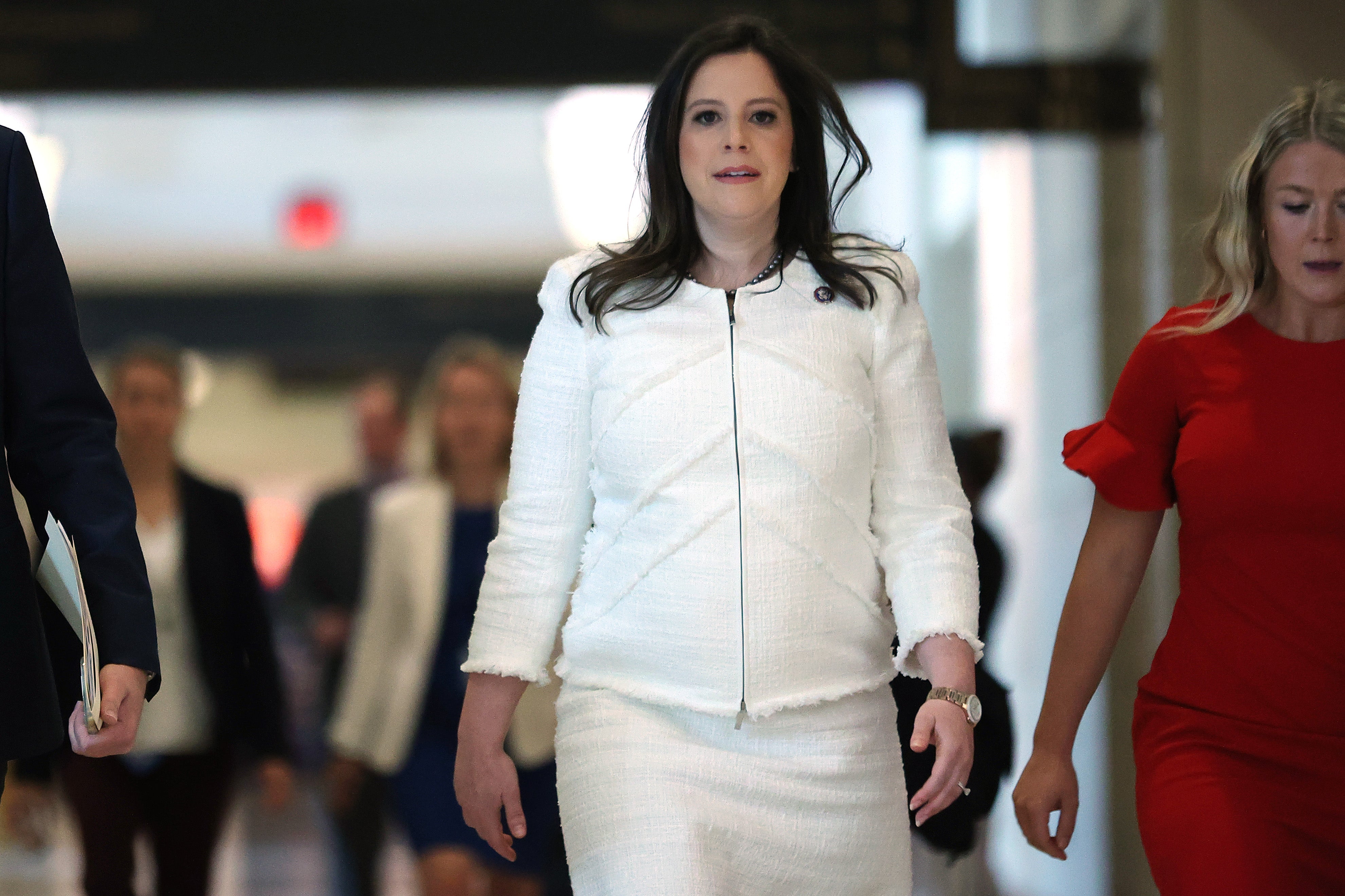 Elise Stefanik leaves a meeting where she was elected House Republican conference chair