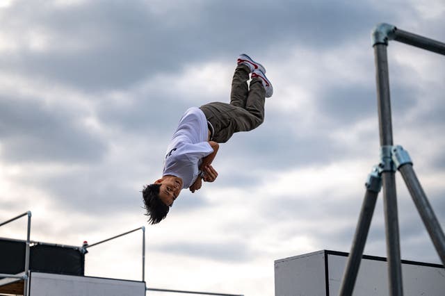 <p>Takeo Watanabe of Japan competes competes during Men's Freestyle Final at the FIG Parkour World Championships in Tokyo</p>