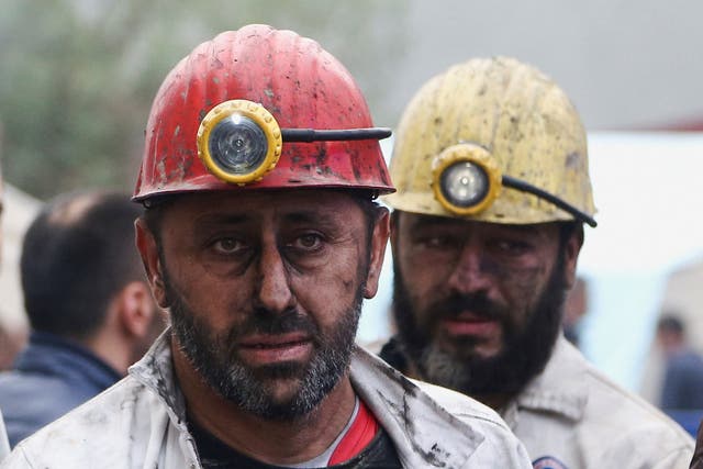 <p>Emotional miners and rescue workers after an explosion in a coal mine in Amasra in Bartin province, Turkey</p>