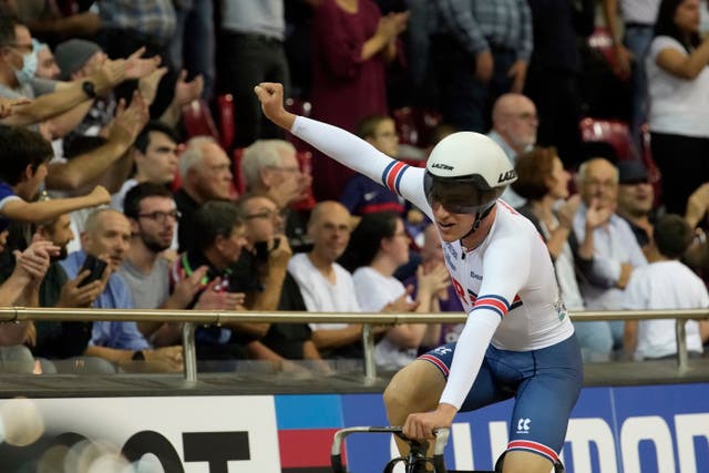 Great Britain’s Ethan Hayter celebrates after winning the omnium in Paris (Christophe Ena/AP).