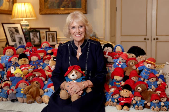 The Queen Consort with a collection of Paddington cuddly toys (Chris Jackson/Buckingham Palace via Getty Images)