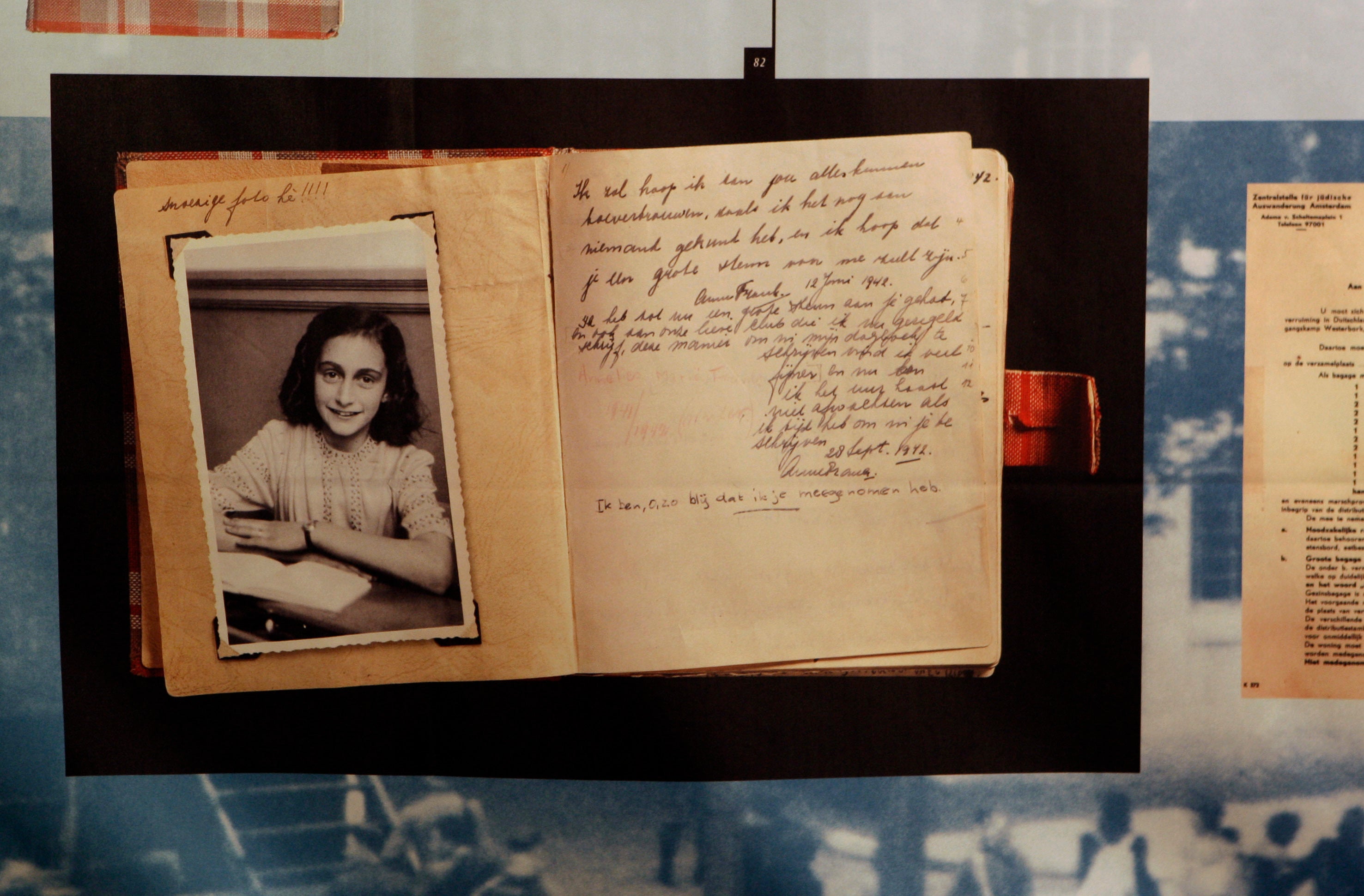A photo of Anne Frank and her diary