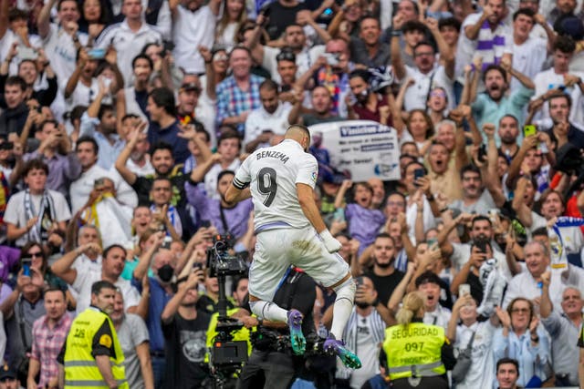 Real Madrid’s Karim Benzema celebrates after opening the scoring against Barcelona (Bernat Armangue/AP/PA)