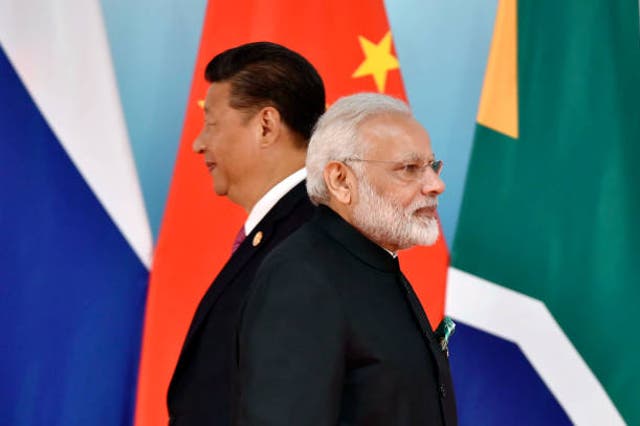 <p>Chinese president Xi Jinping and Indian prime minister Narendra Modi at a Brics summit in Xiamen, China in 2017 </p>
