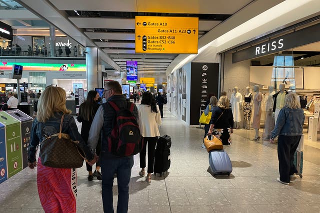 <p>Taxing times: Shoppers ‘airside’ at Heathrow airport Terminal 5</p>