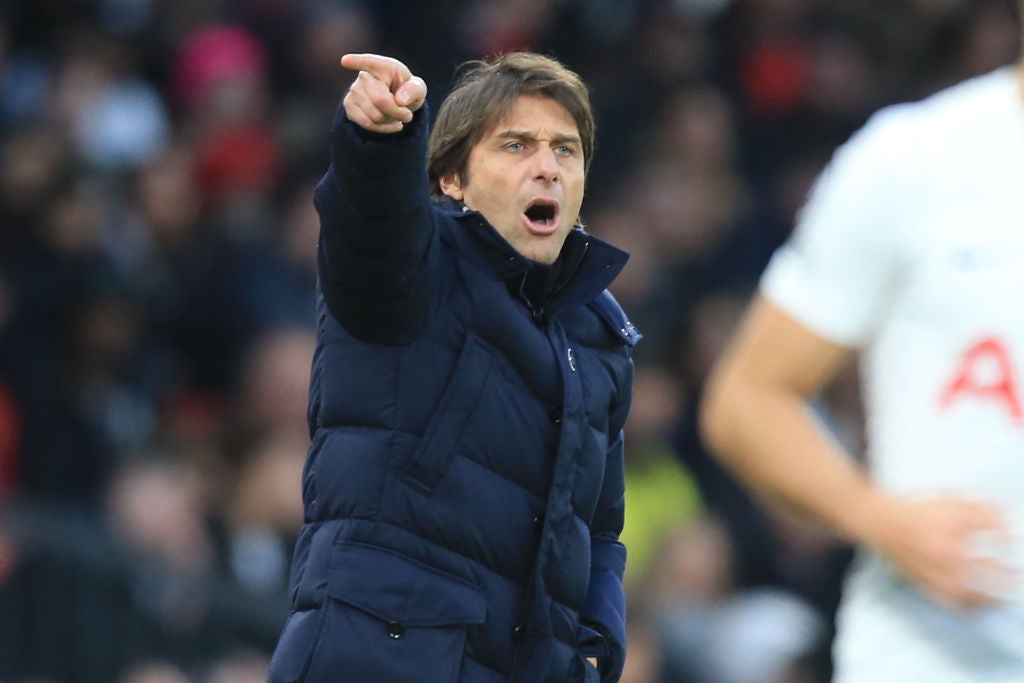 Spurs manager Conte directs his players during the fixture at Old Trafford in March