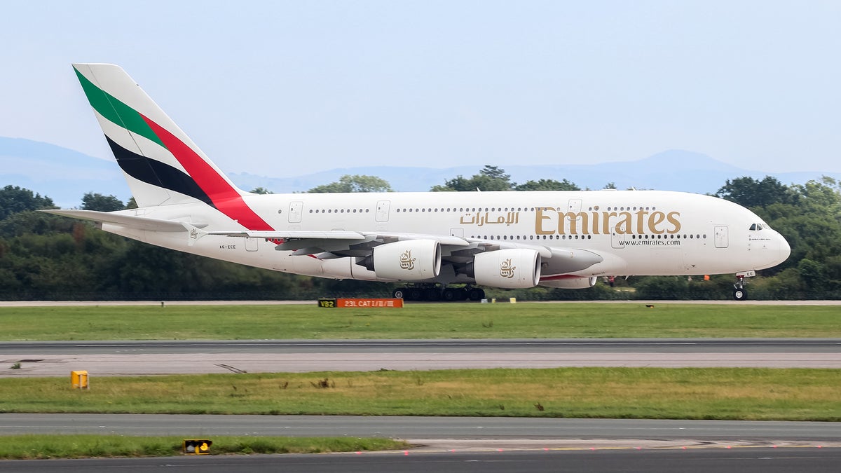 Manchester airport temporarily closed and flights diverted after bomb threat to Emirates jet