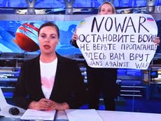 Russian state TV journalist who spoke out against war live on air recounts daring escape from country
