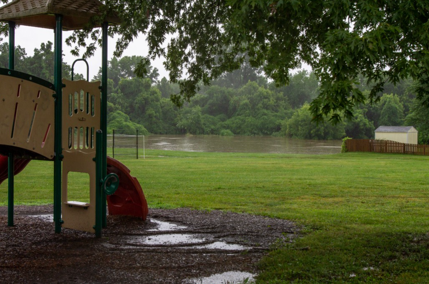 Coldwater Creek flooding into the grounds of Jana Elementary School in Florissant, Missouri