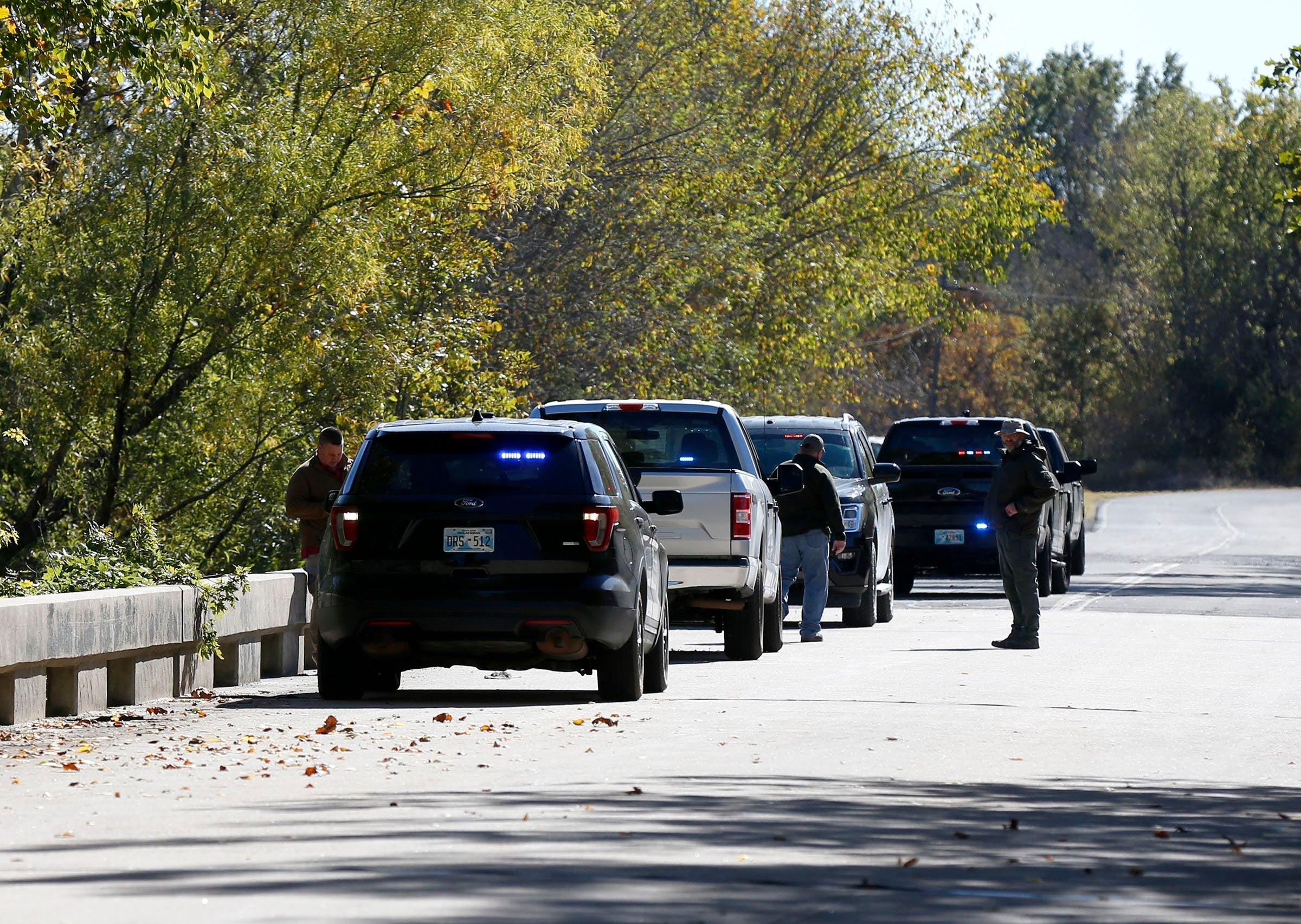Oklahoma authorities at the Deep Fork River in Okmulgee, where the four bodies were found