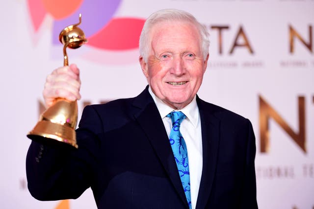 David Dimbleby with the Special Recognition award in the Press Room at the National Television Awards 2019 held at the O2 Arena, London (Ian West/PA)
