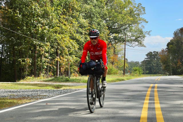 Gordon Miller cycling through the east coast of America (James Aubry/Humble Hedgehog Productions/PA)
