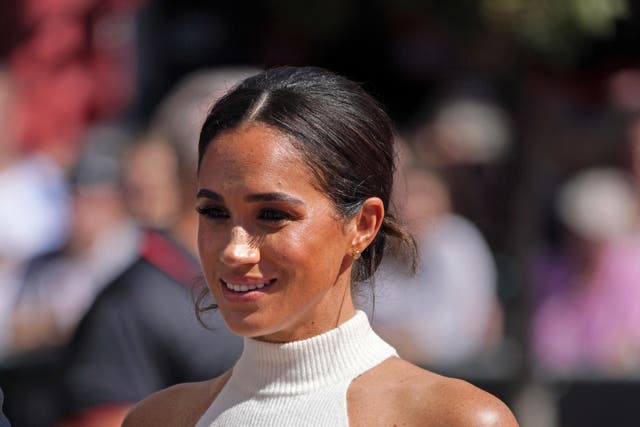 The Duchess of Sussex has said she disliked feeling ‘forced to be all looks and little substance’ during her stint as a briefcase girl (Joe Giddens/PA)