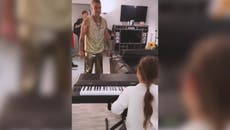 Robbie Williams serenaded by daughter Teddy in adorable home video