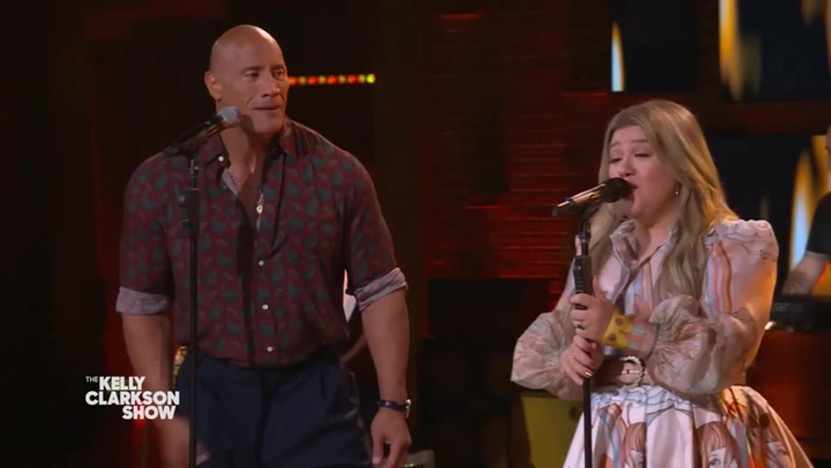 Dwayne Johnson and Kelly Clarkson perform duet to honour country icon Loretta Lynn