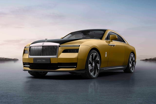 Rolls-Royce has unveiled its first pure electric car, Spectre (Rolls-Royce/PA)