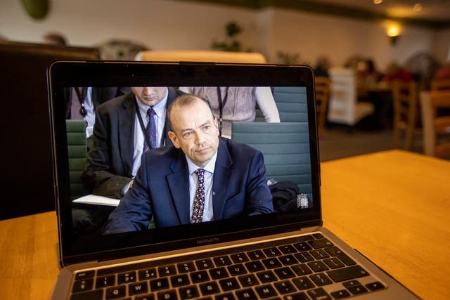 Laptop screen showing Chris Heaton-Harris MP, Secretary of State for Northern Ireland speaking during a Northern Ireland Affairs Committee hearing (Liam McBurney/PA)