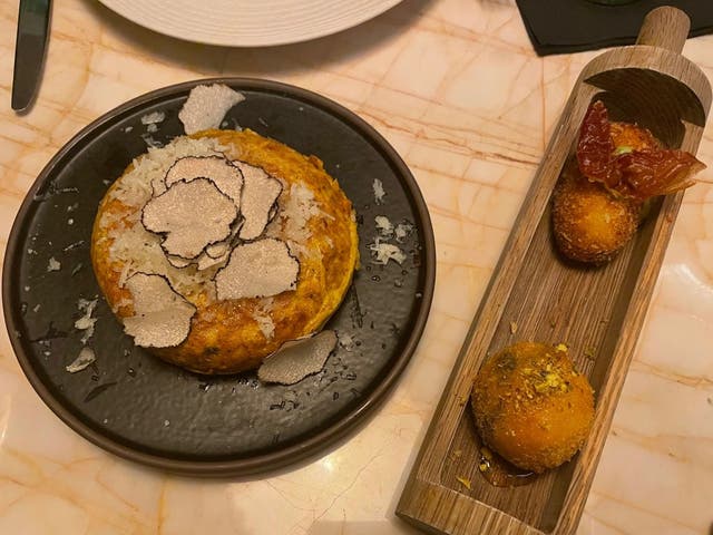 <p>Start with a tortilla de trufa (truffle omelette with manchego cheese) and some jamon or goat’s cheese, pistachio and honey croquettes </p>