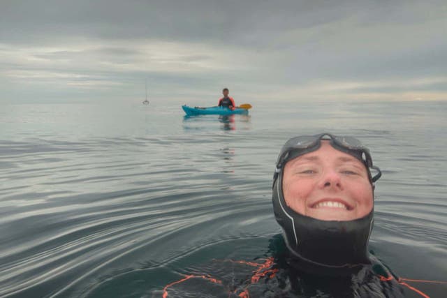 Jasmine Harrison, 23, has become the first woman in the world to swim from John O’Groats to Land’s End (Simon Price from FirstPix/PA)