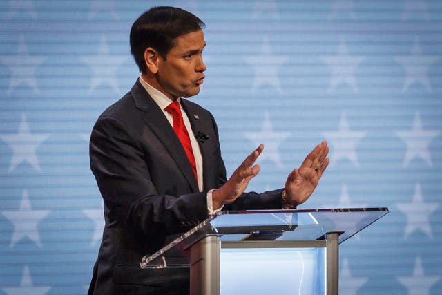 <p>Marco Rubio participates in a debate with challenger Val Demings at Duncan Theater on the campus of Palm Beach State College in Palm Beach County on 18 October</p>