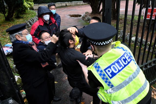 <p>A protester was injured following a scuffle between a Hong Kong pro-democracy protester and Chinese consulate staff</p>