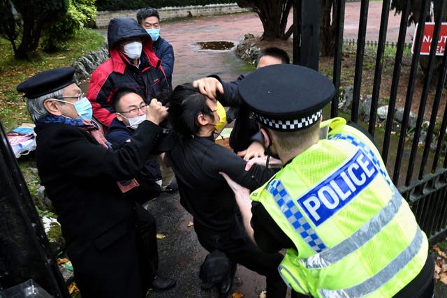 <p>A protester was injured following a scuffle between a Hong Kong pro-democracy protester and Chinese consulate staff</p>