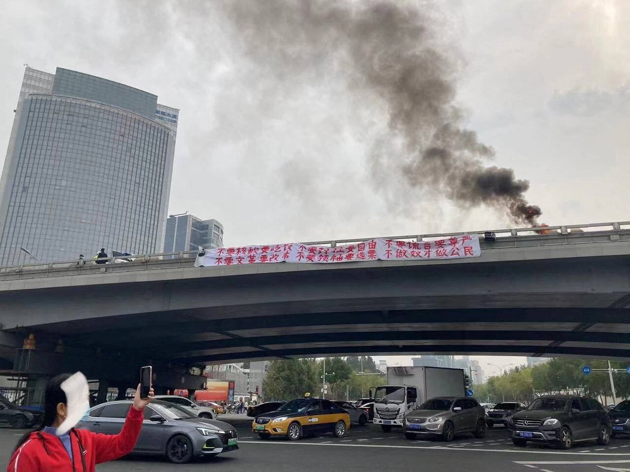 ‘Bridge Man’: How activist’s rare anti-Xi message in China is inspiring solidarity protests around the world