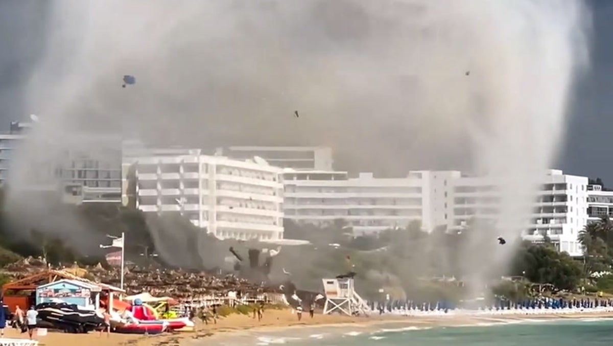 Waterspout sends tourists running for cover as it tears Ayia Napa beach  apart