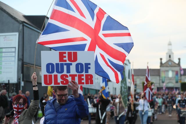 People take part in a Loyalist protest in Newtownards, County Down, against the Northern Ireland Protocol. Picture date: Friday June 18, 2021 (Brian Lawless/PA)