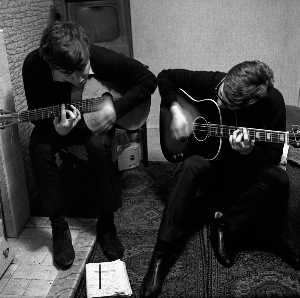 ‘I Saw Her Standing There’ shows John and Paul hunched over their guitars, studiously working at the track – www.MikeMcCartneyBook.com