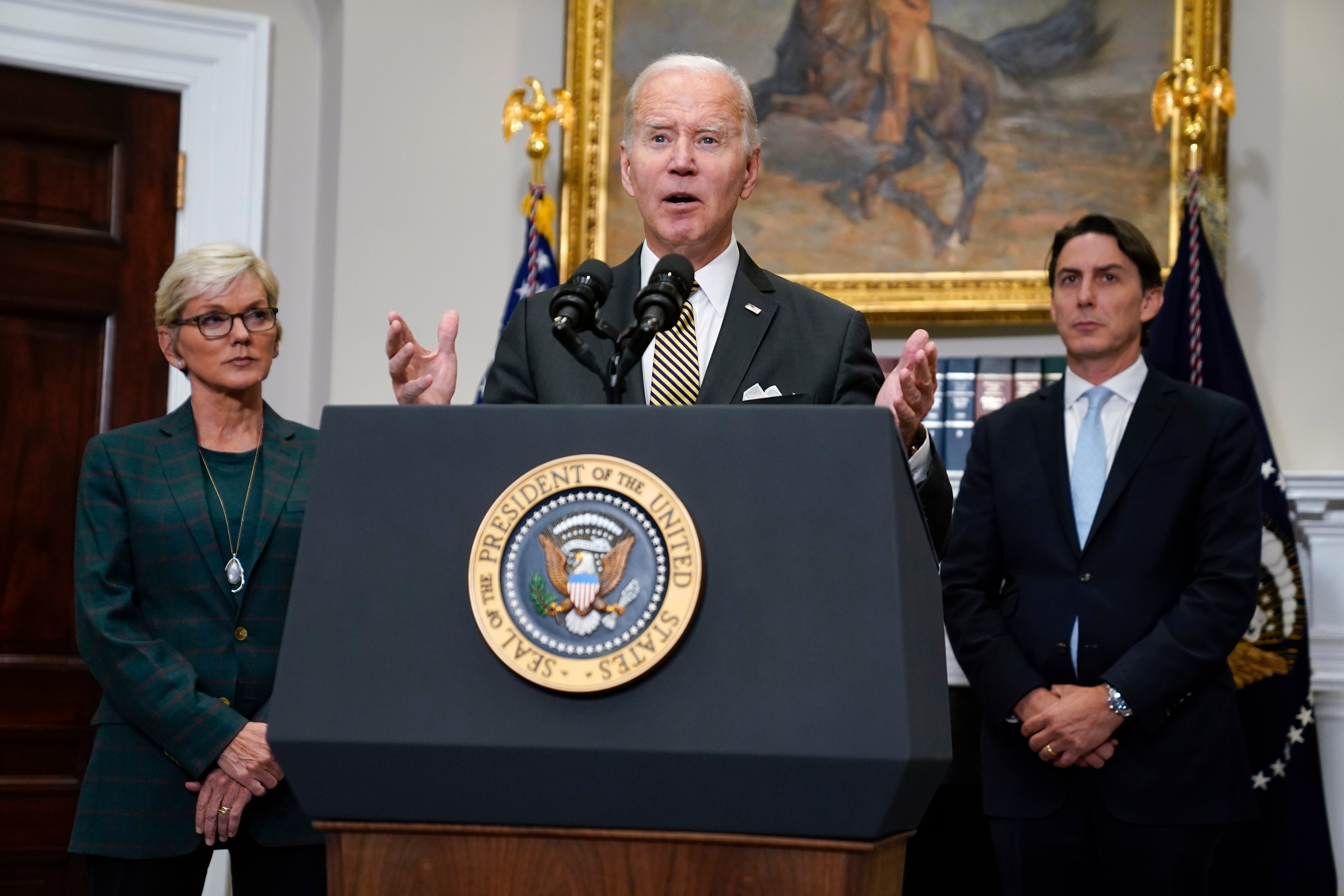 Energy Secretary Jennifer Granholm, left, and Special Presidential Coordinator Amos Hochstein, right, listen as President Joe Biden speaks about energy and the Strategic Petroleum Reserve during an event in the Roosevelt Room of the White House, Wednesday, Oct. 19, 2022, in Washington. (AP Photo/Evan Vucci)