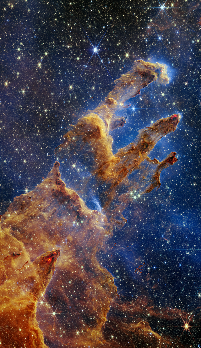 <p>The Pillars of Creation, a region of new star formation within the Eagle Nebular, as imaged by the James Webb Space Telescope</p>