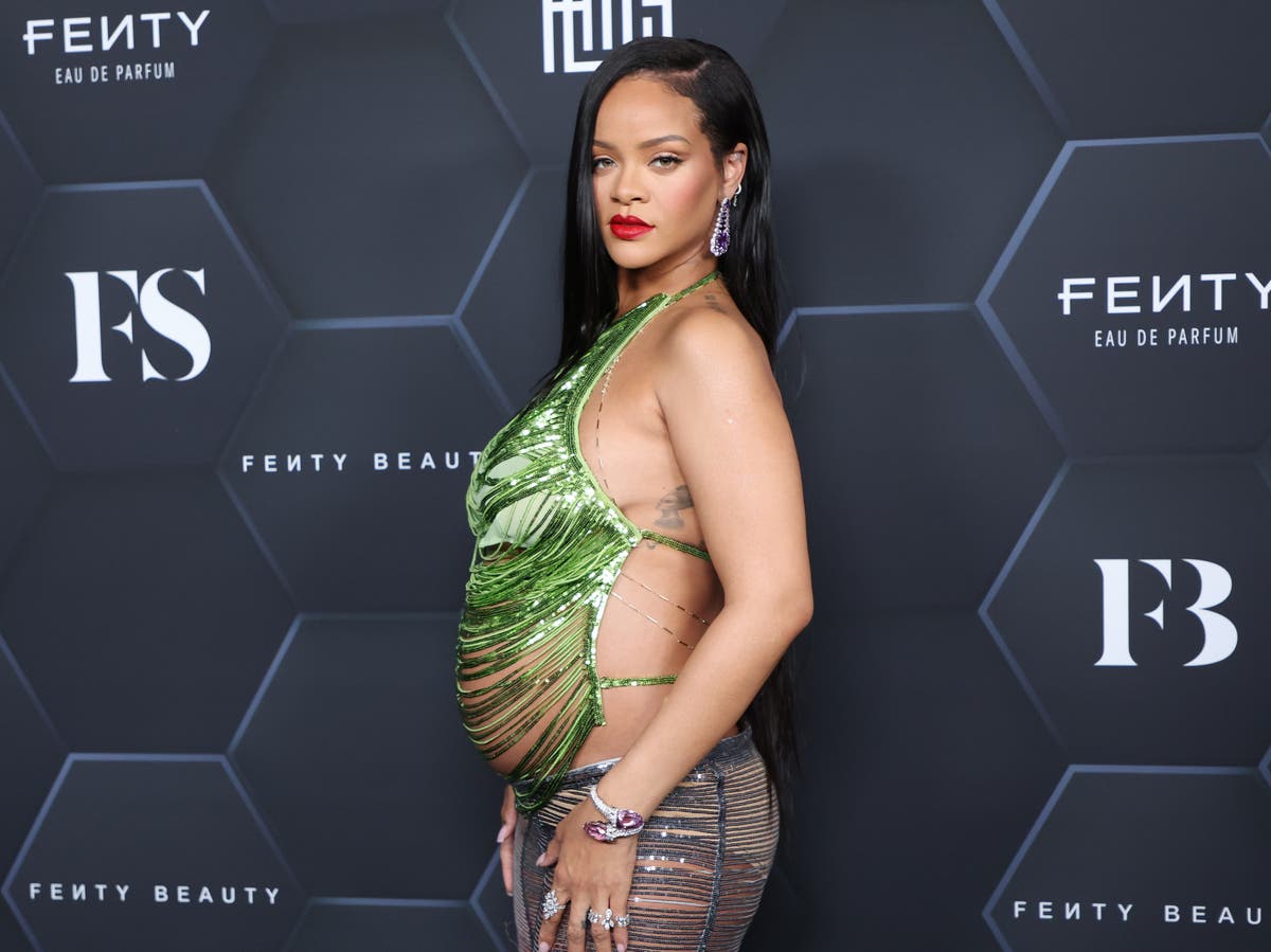 Pregnant Rihanna models red bra & thong from Savage X Fenty edit