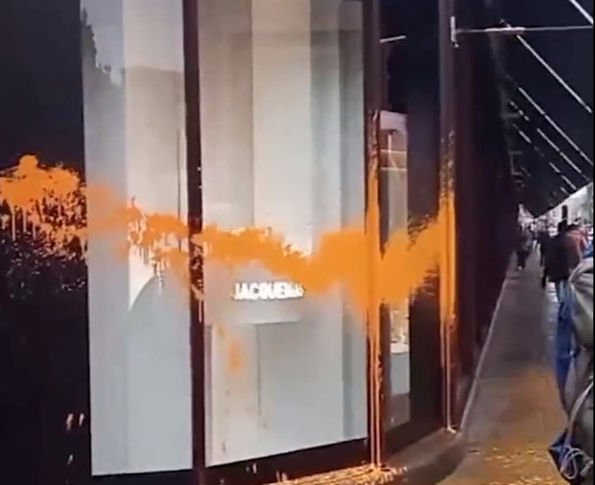 Front windows at Harrods sprayed with orange paint by Just Stop Oil protesters - OLD Front windows at Harrods sprayed with orange paint by Just Stop Oil protesters - OLD