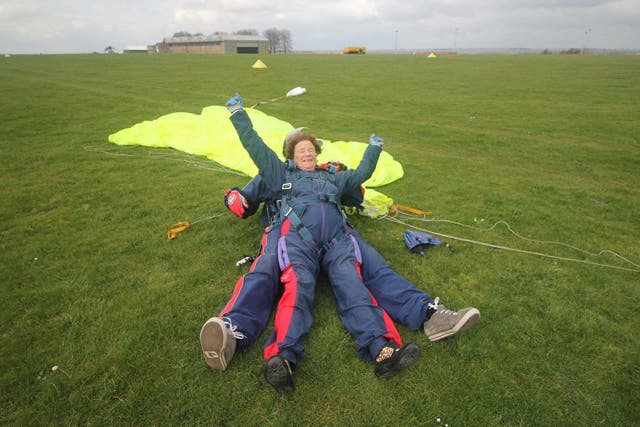 <p>Mercy Baggs after completing a parachute jump</p>
