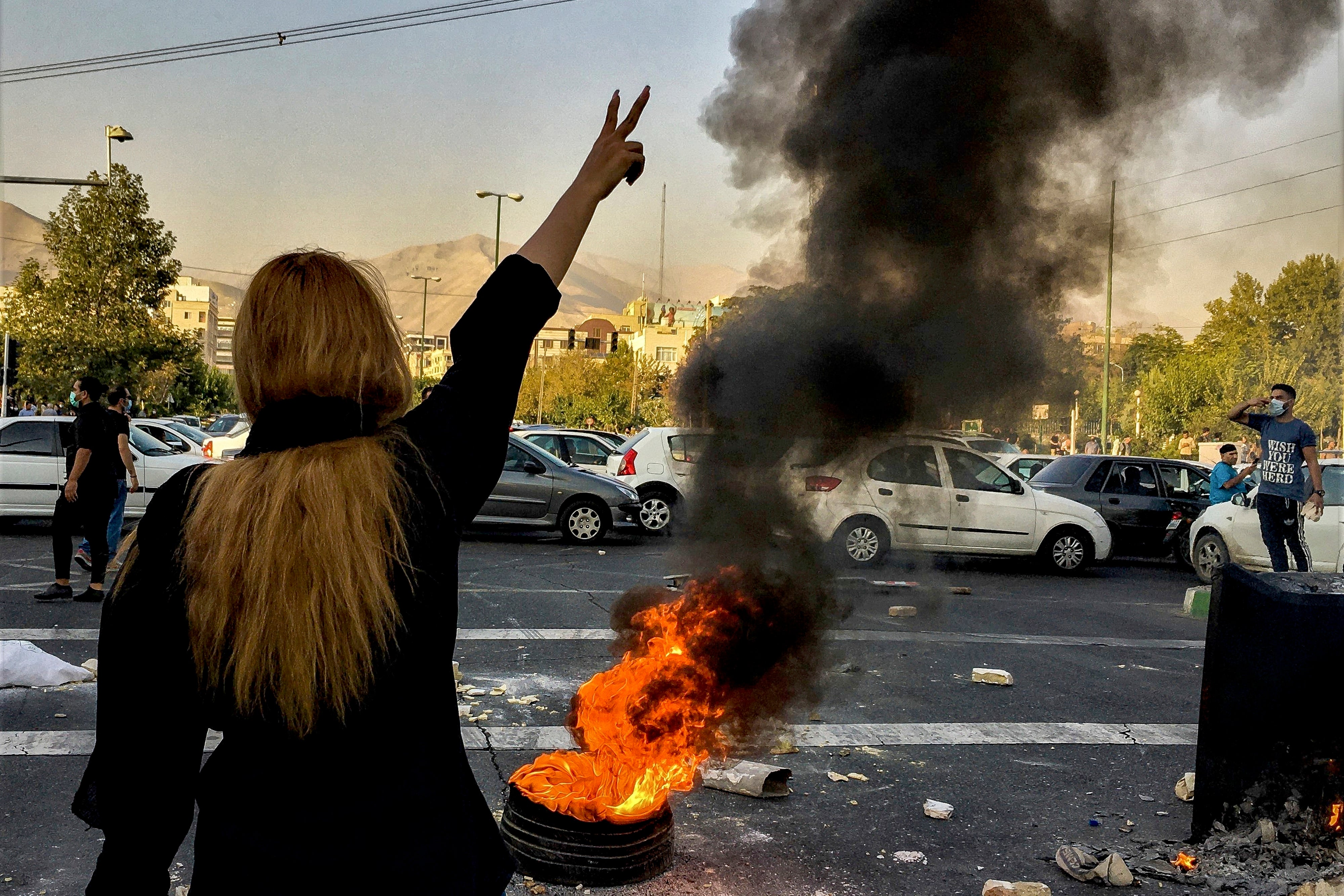 Iranians protest the death of 22-year-old Mahsa Amini