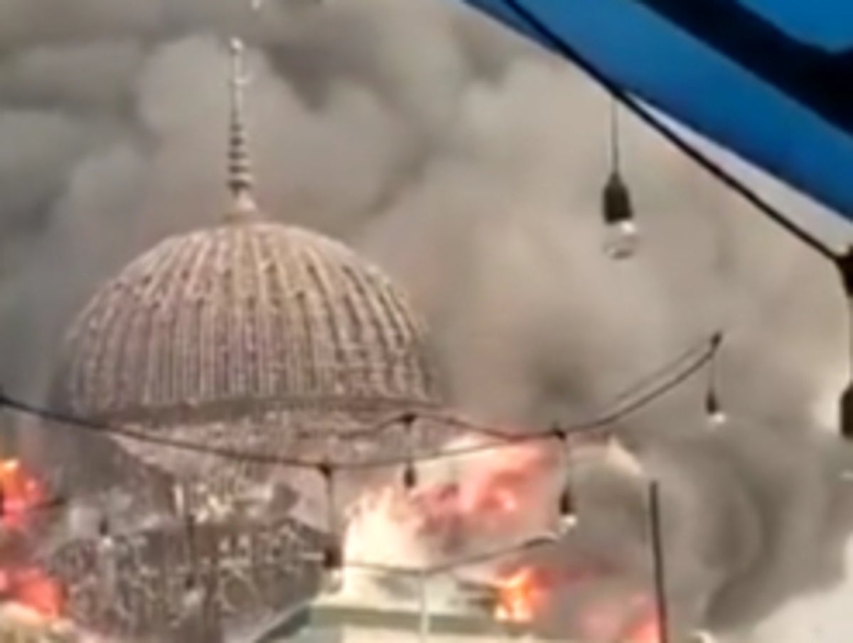 Dramatic footage shows giant dome of Jakarta mosque collapsing after major fire