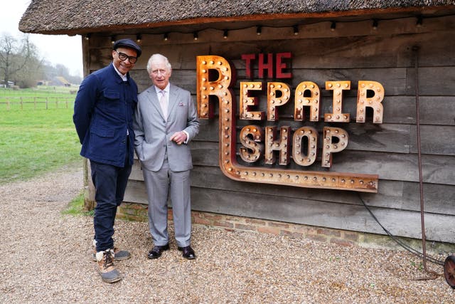 The King, then Prince of Wales, and Jay Blades who will appear in a special episode of The Repair Shop as part of the BBC’s centenary celebrations (Ian West/BBC/Ricochet Ltd)