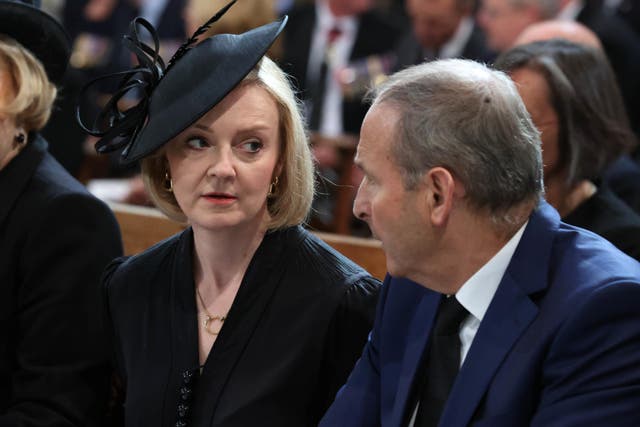 Prime Minister Liz Truss and Taoiseach Micheal Martin at a Service of Reflection for Queen Elizabeth II at St Anne’s Cathedral in Belfast (PA)