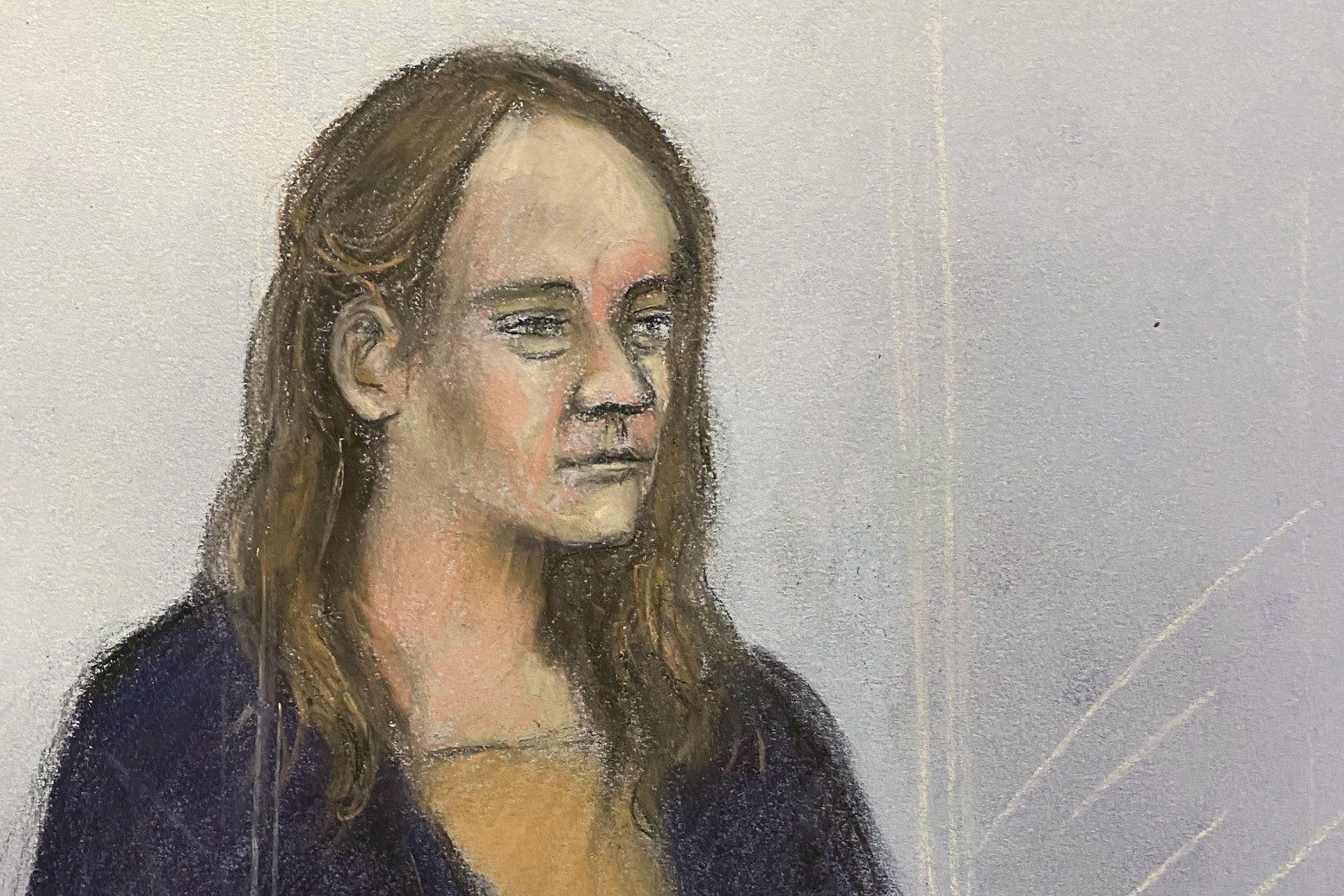A sketch of Lucy Letby listening from the dock at Manchester Crown Court