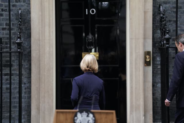 Liz Truss walks back into 10 Downing Street, London, after making a statement in which she announced her resignation as Prime Minister (Kirsty O’Connor/PA)