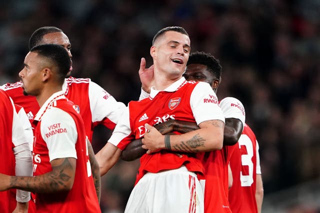 Arsenal’s Granit Xhaka (34) celebrates with team-mate Thomas Partey after scoring the only goal of the game (Zac Goodwin/PA)