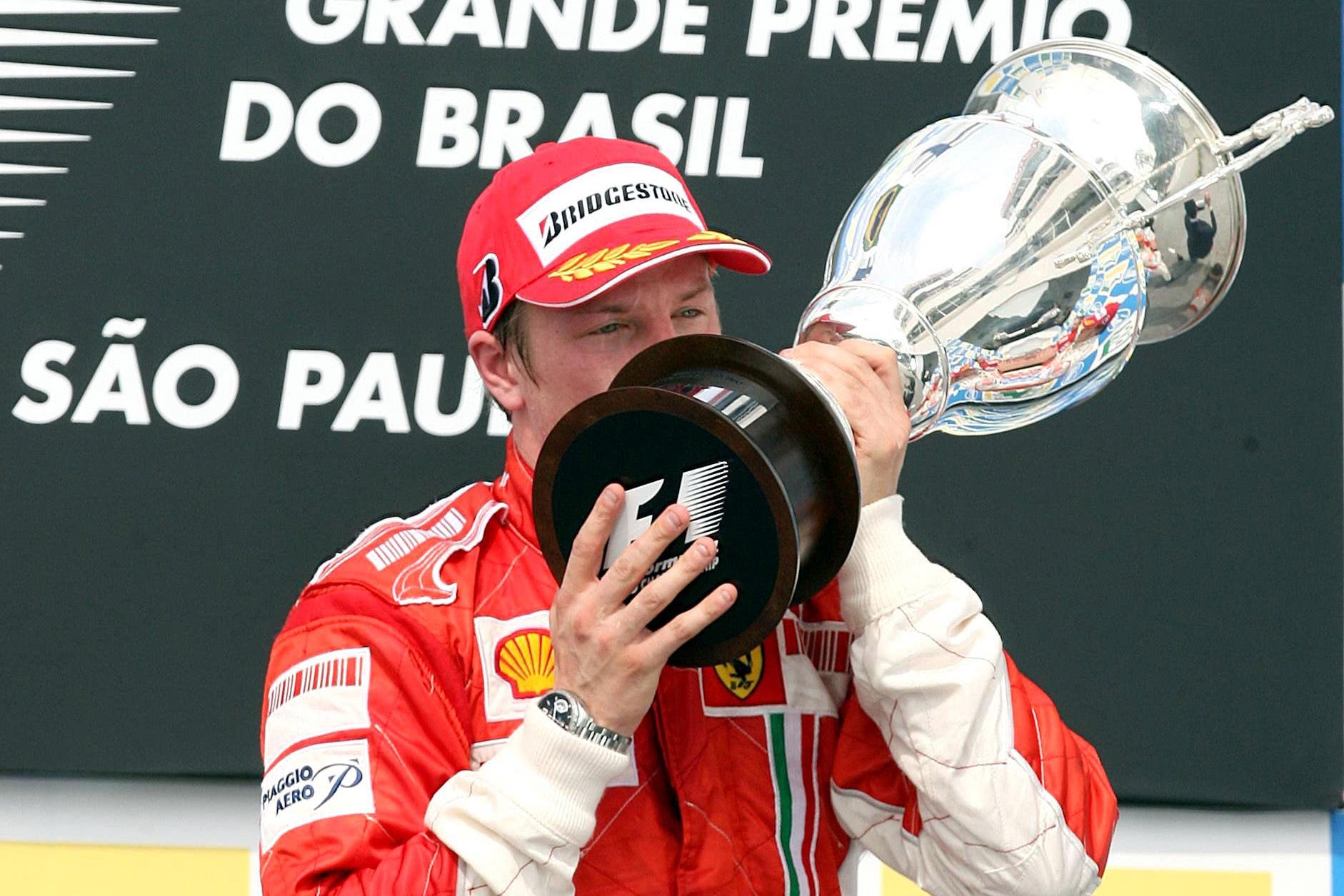 Finland’s Kimi Raikkonen celebrates his victory following the Brazilian Grand Prix at Interlagos (Martin Rickett/PA