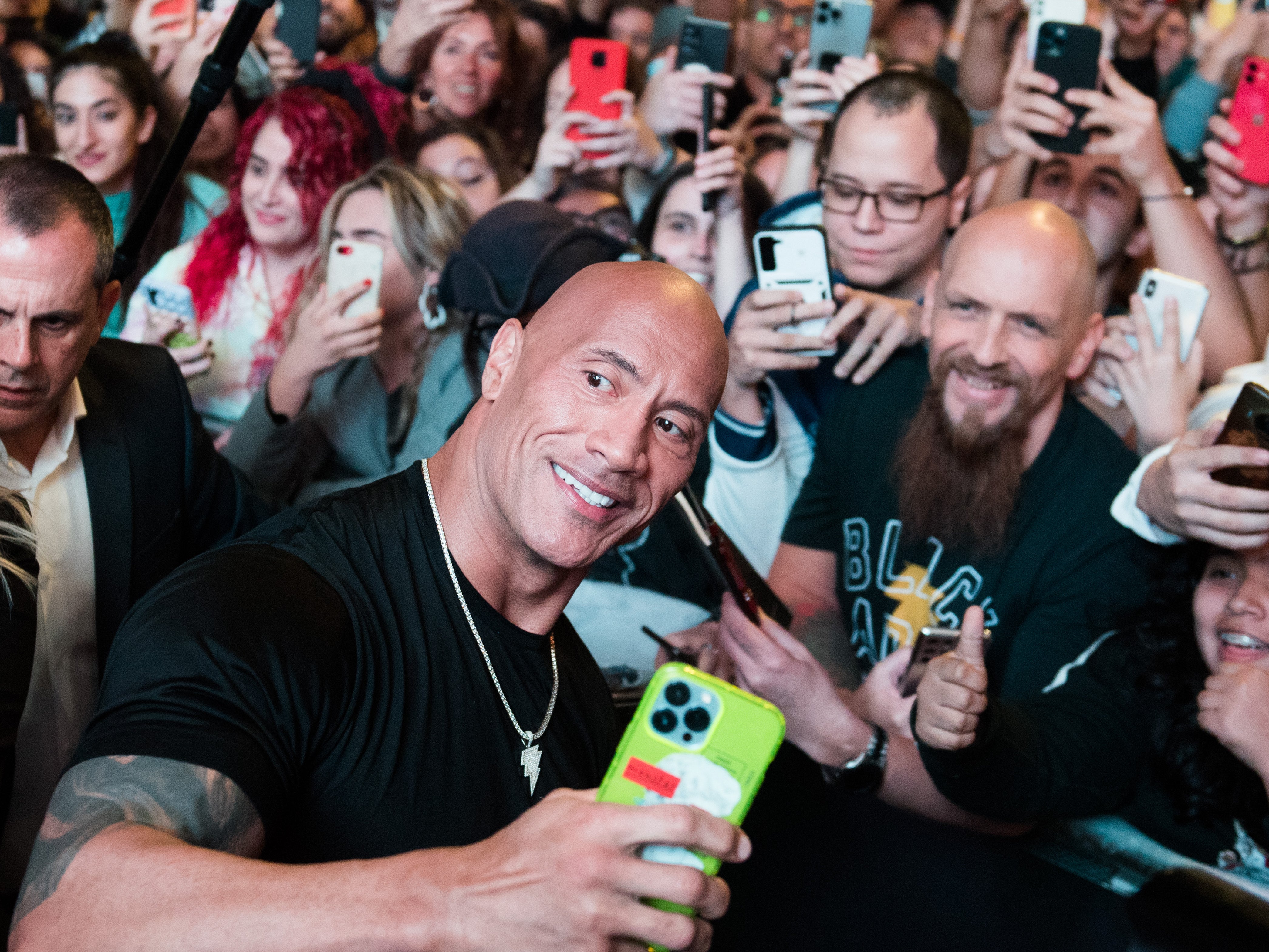 Dwayne ‘The Rock’ Johnson poses with fans at the premiere of ‘Black Adam’ in Madrid