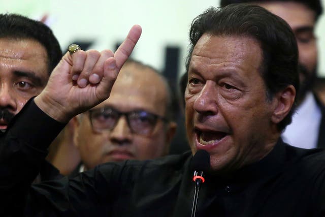 <p>Imran Khan, former prime minister and head of the opposition political party Pakistan Tehreek-e-Insaf, addresses his supporters last week at an event in Karachi</p>