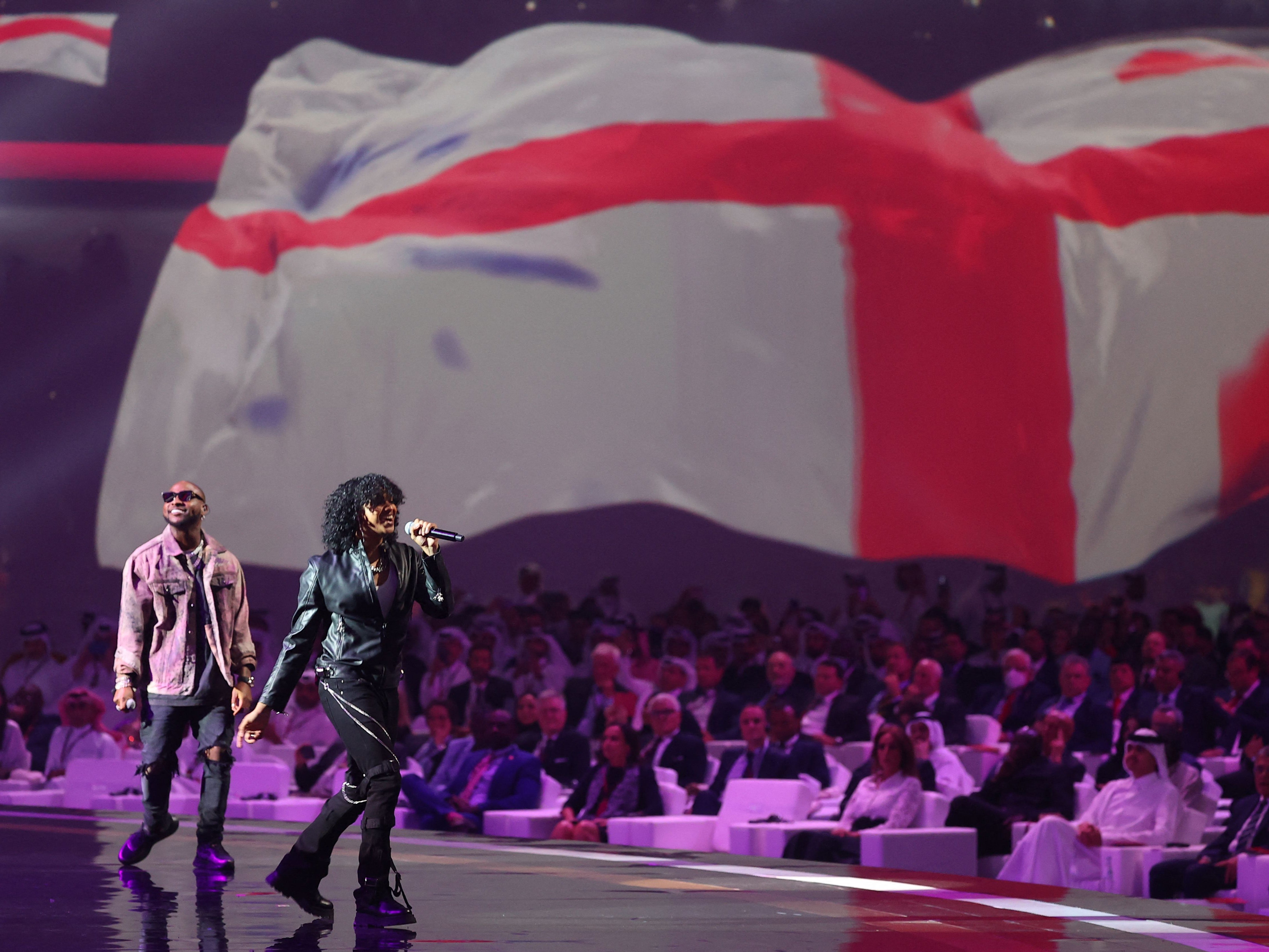Davido and Trinidad Cardona perform in Qatar during the draw for the 2022 World Cup