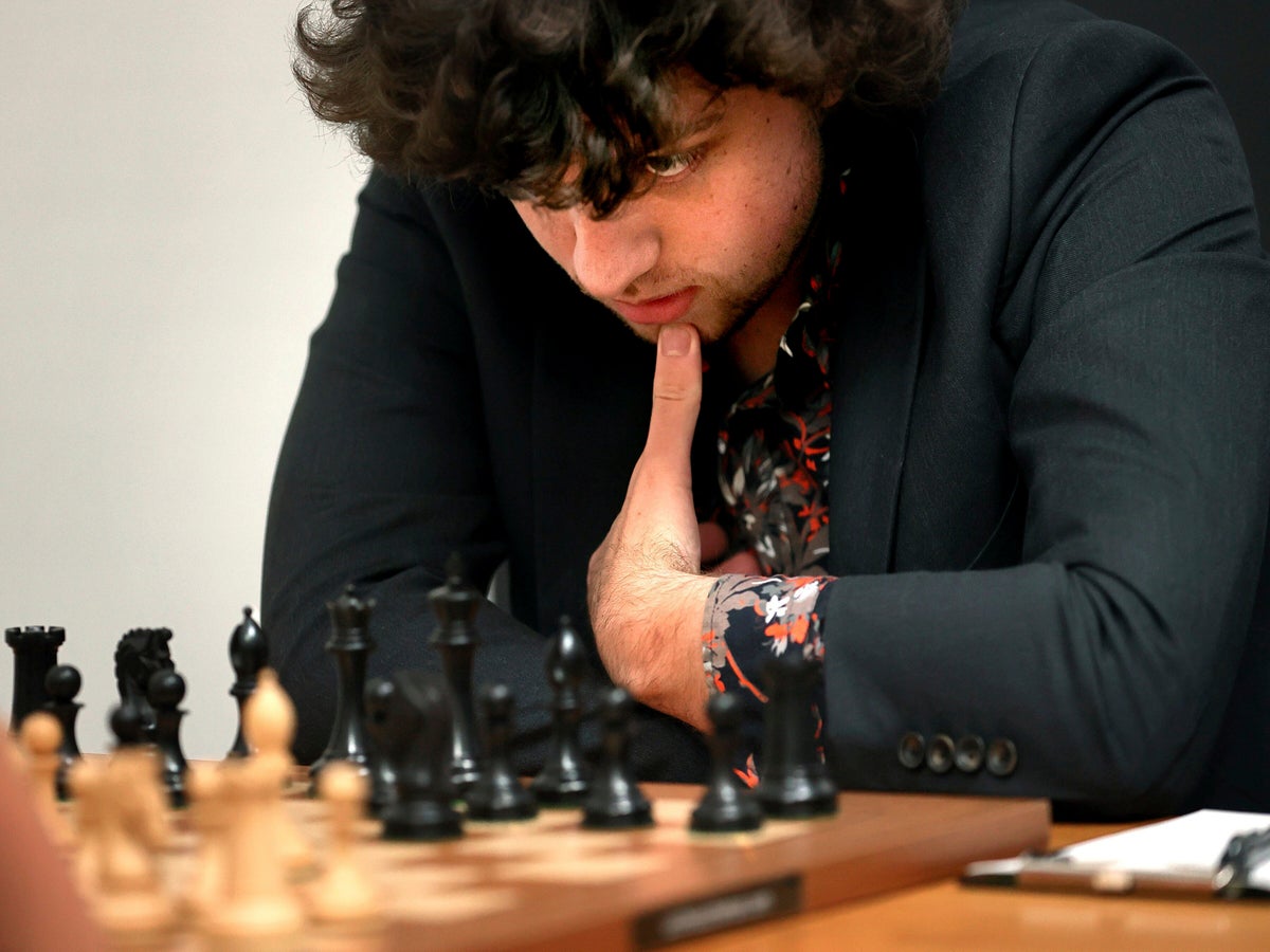 Hans Niemann: Chess grandmaster, 19, accused of cheating using a SEX TOY to  beat world #1 Magnus Carlsen